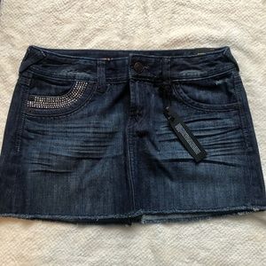 Express distressed blue denim mini skirt with rhinestone-embellished Pockets